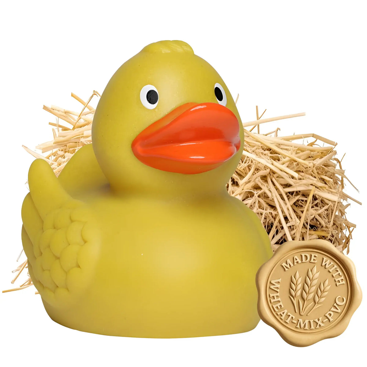Gelbe quietsche-ente weizen-ente klassik 7,5 cm mit orangenem schnabel und schwarzen augen im strohnest