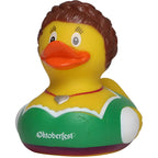 Gelbe badeente mit braunen locken trägt grünes weißes oktoberfest dirndl und silberherz an rotem band