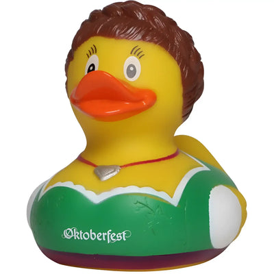 Gelbe badeente mit braunen locken trägt grünes weißes oktoberfest dirndl und silberherz an rotem band