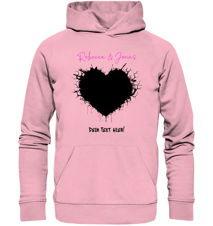 Pink kinder hoodie mit schwarzem splatter herz und pinkem schriftzug aus der wildes herz statement kollektion