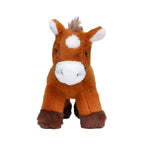 Kleines zwergpony luna ist ein plüschiges braunes pferd mit weißen abzeichen aus weichem stoff zum kuscheln